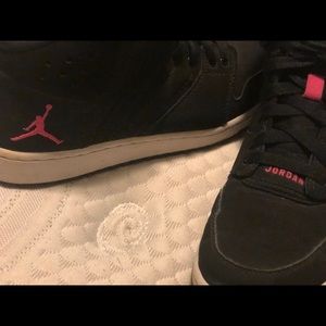 Black with pink Jordans